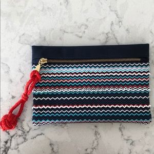 Navy blue clutch with colourful accents
